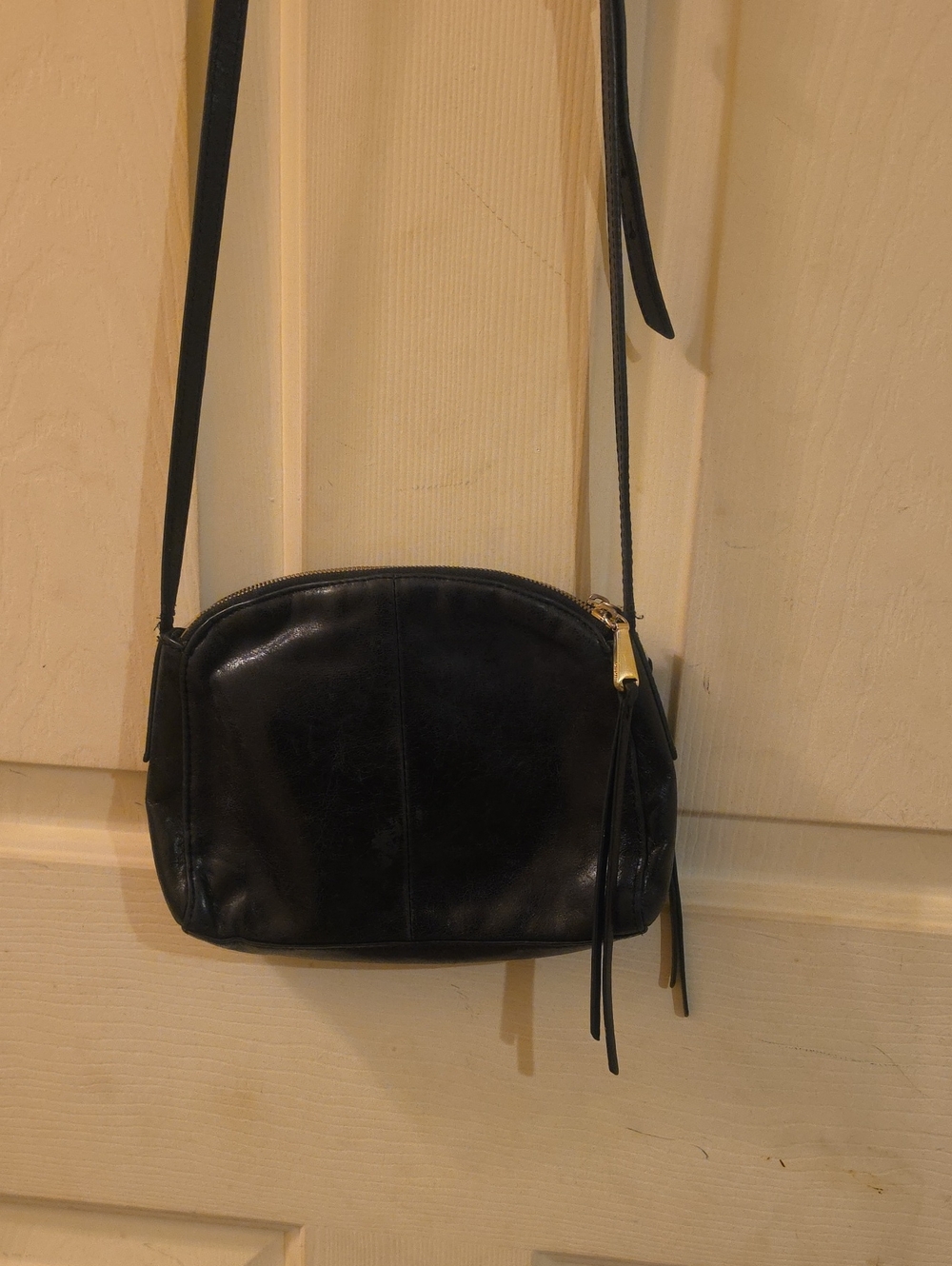 HOBO Black Leather Crossbody with Tassel Accent